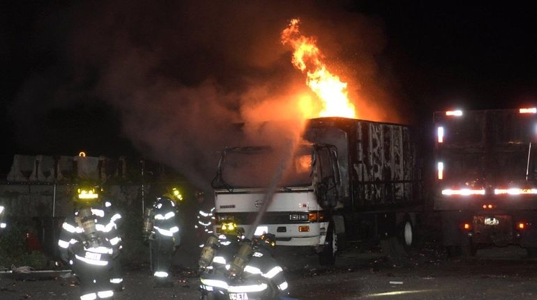 An early morning truck fire at a contractor's storage yard...