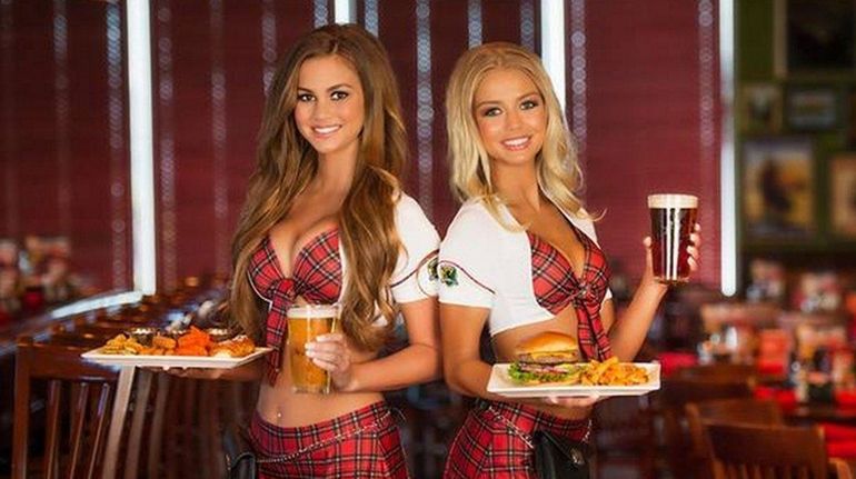 The staff is scantily clad at Tilted Kilt Pub &...