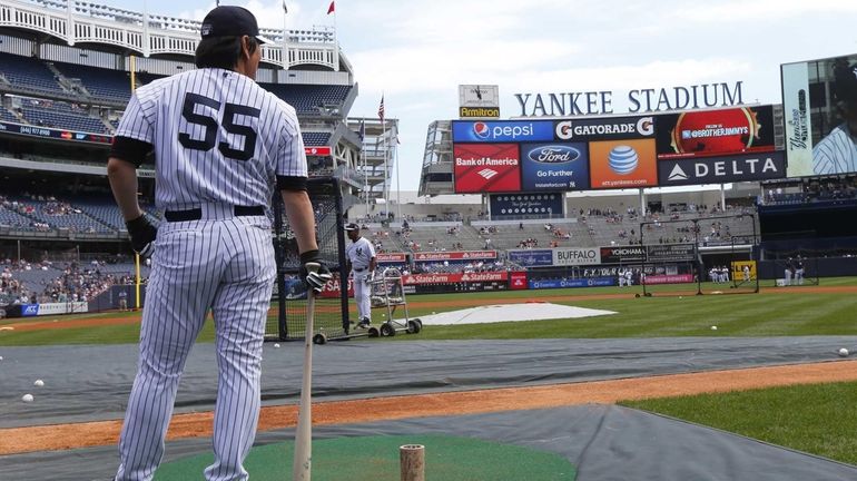 Former New York Yankees Hideki Matsui #55 waits for batting...