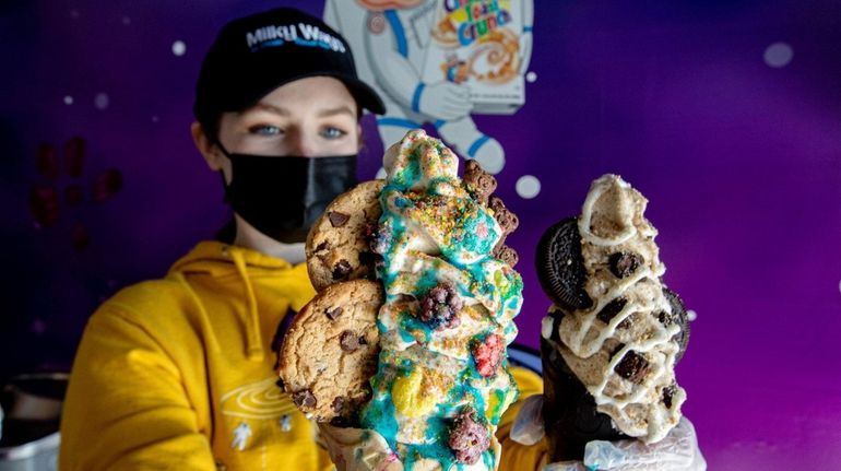 Victoria Mangan holds a make-your-own cereal cone at Milky Ways...