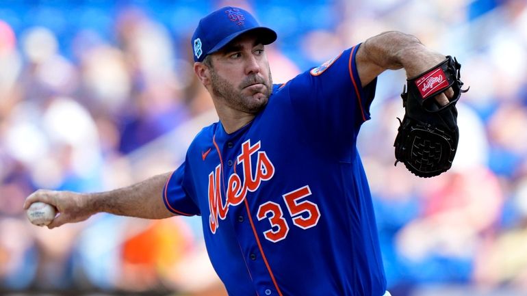 Mets starting pitcher Justin Verlander throws during the first inning...