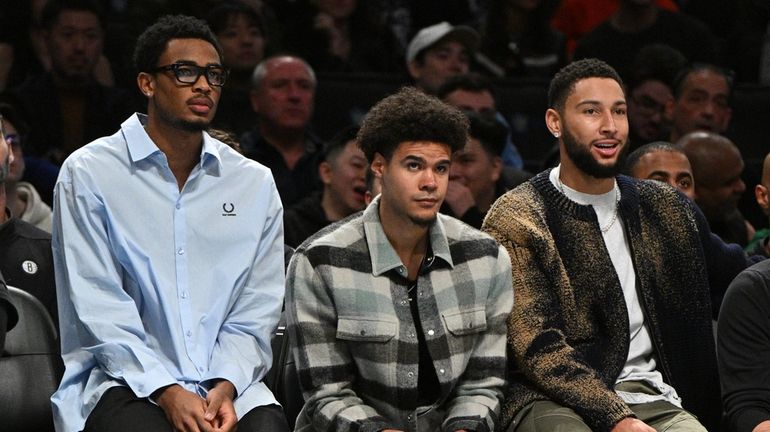 Nets center Nic Claxton, forward Cameron Johnson and guard Ben...