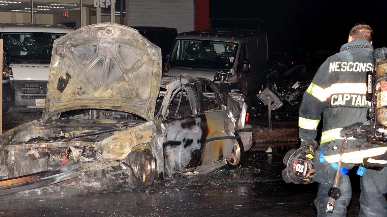 Cops: Man DWI in crash into car storage lot - Newsday
