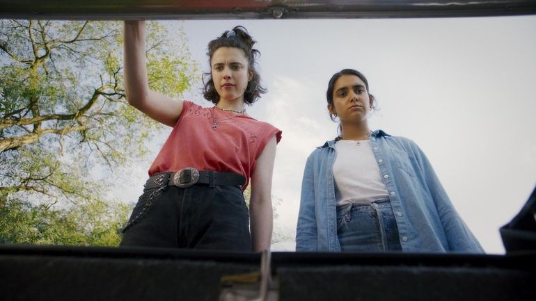 Margaret Qualley (left) and Geraldine Viswanathan in director Ethan Coen's "Drive-Away...