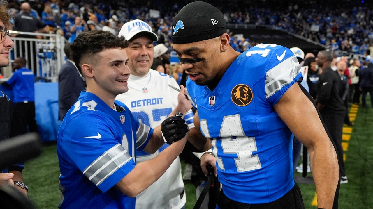 Lions Injured DE Aidan Hutchinson Surprises 20 Year Old Marine With 4 1280