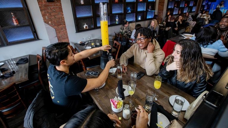 Long Island Café opens with mimosa towers, breakfast happy hours 