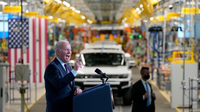 President Joe Biden speaks during a visit to the General...