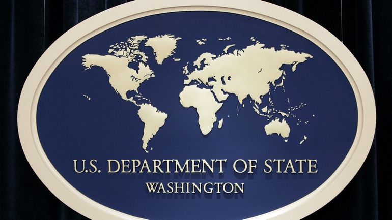 U.S. Department of State sign is seen at the State...