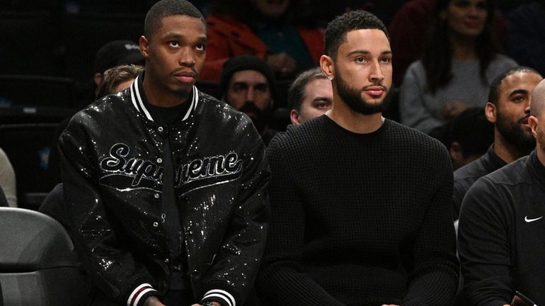 Brooklyn Nets guard Dennis Smith Jr. and guard Ben Simmons...