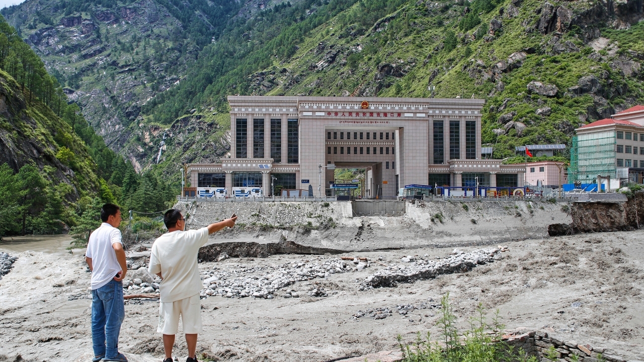 Rescuers search for 19 missing and recover 9 bodies after flooding in ...