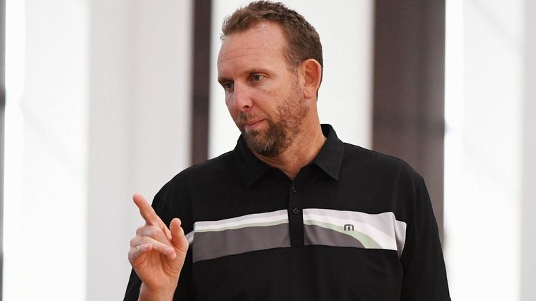 Nets general manager Sean Marks looks on during training camp...