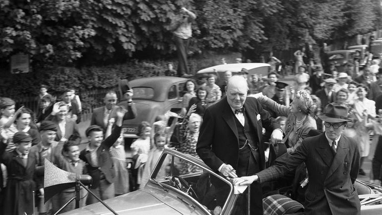 Britain's Prime Minister Winston Churchill, accompanied by his wife Clementine...