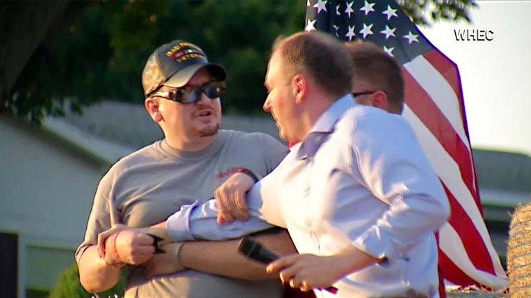 David Jakubonis, left, accosts GOP gubernatorial candidate Lee Zeldin during...