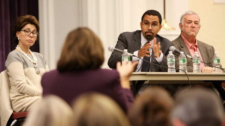 Plainview-Old Bethpage Central School District Superintendent Lorna Lewis addresses, from...