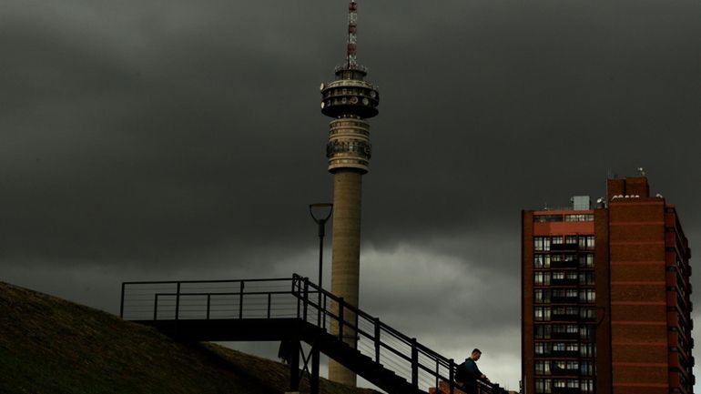 A man walks downstairs outside the Constitutional Court in Johannesburg,...