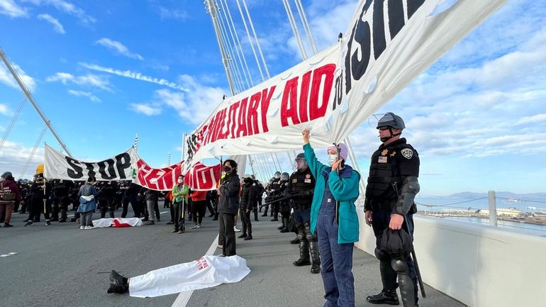 Demonstrators shut down the San Francisco Oakland Bay Bridge in...