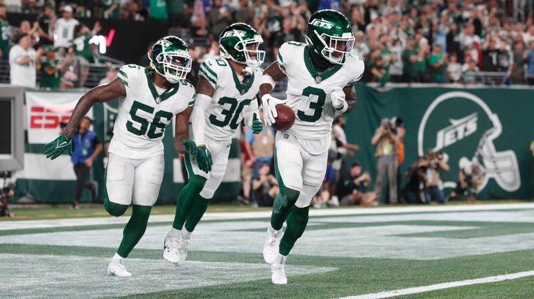 Jordan Whitehead #3 of the New York Jets celebrates his...