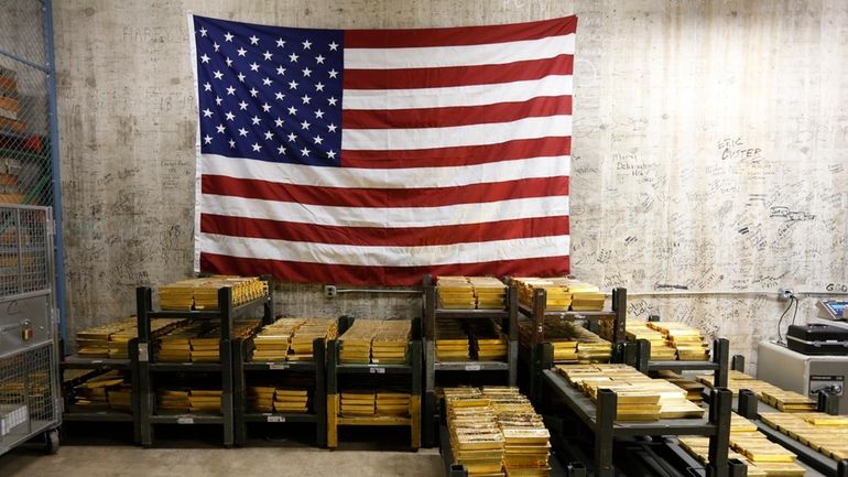 Gold bars are stacked in a vault at the U.S....