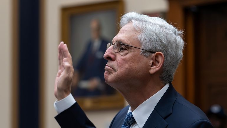 Attorney General Merrick Garland is sworn in as he appears...