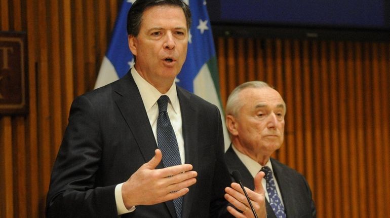 FBI Director James B. Comey, left, and NYPD Commissioner William...