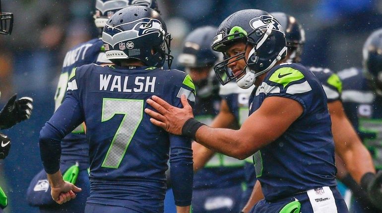 Seahawks kicker Blair Walsh gets a pat on the back...