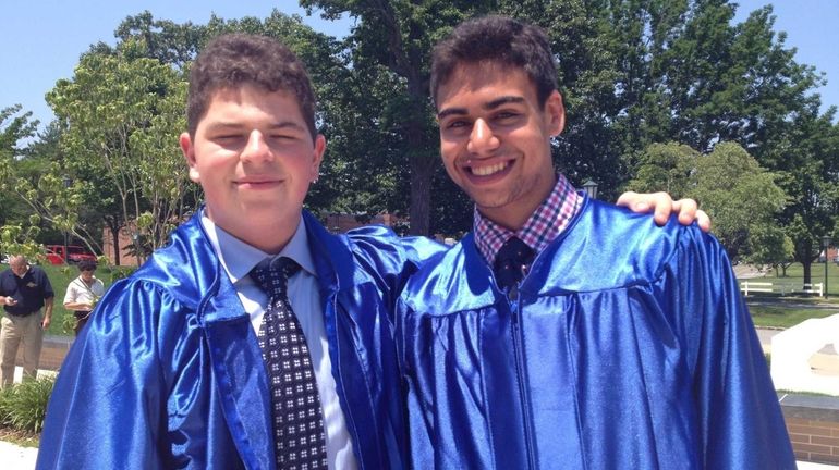 Jake Gershenson, 17, right, and Mitchell Plotkin, 17, celebrate their...