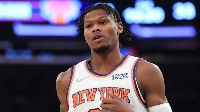 Knicks forward Cam Reddish runs up court against the Thunder...