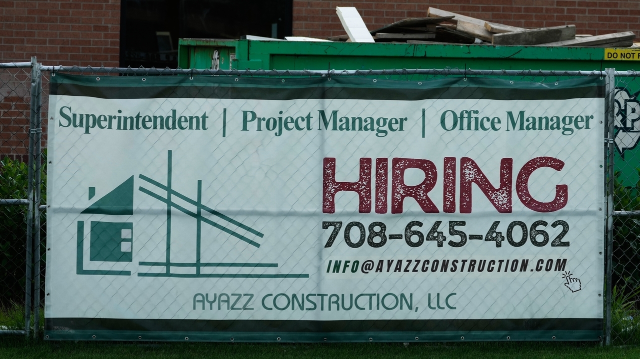 U.S. filings for jobless aid fall to 215,000 as layoffs remain at ...