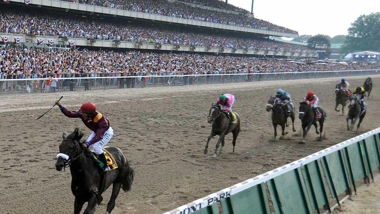 Da'Tara with jockey Alan Garcia crosses the finish line to...