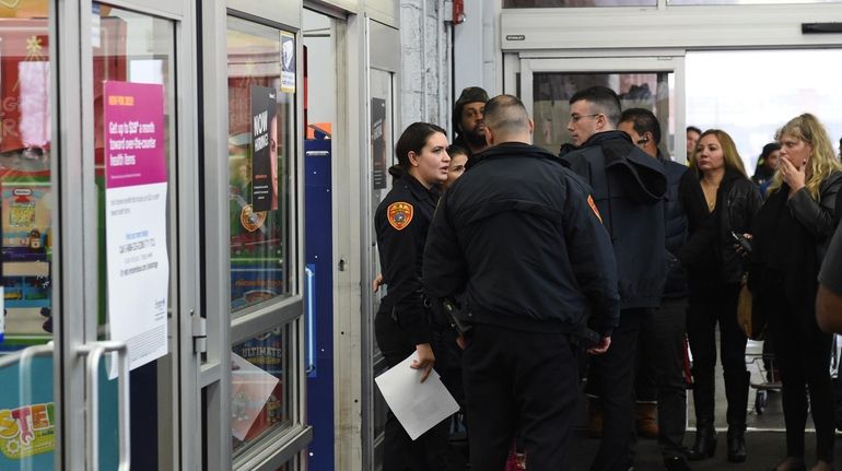 Police respond to Walmart on Crooked Hill Road in Commack...