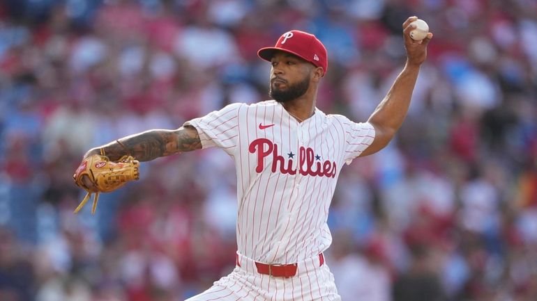 Philadelphia Phillies' Cristopher Sanchez pitches during the first inning of...