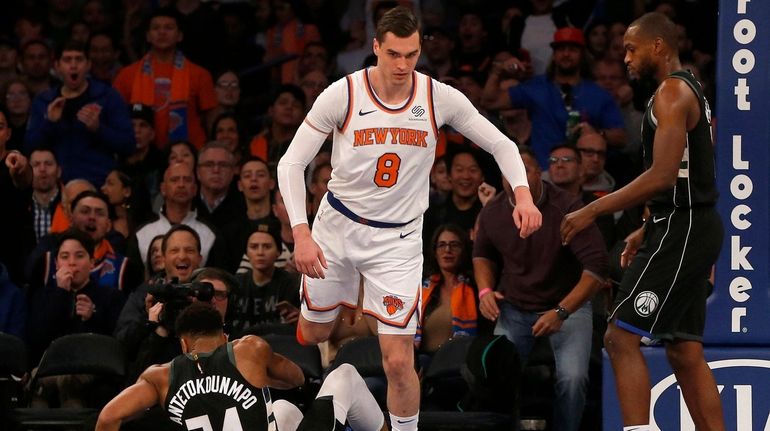 Mario Hezonja of the Knicks steps over Giannis Antetokounmpo, who said...