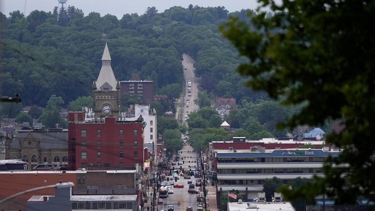 Traffic travels down Main Street in Butler, Pa., Wednesday, July...