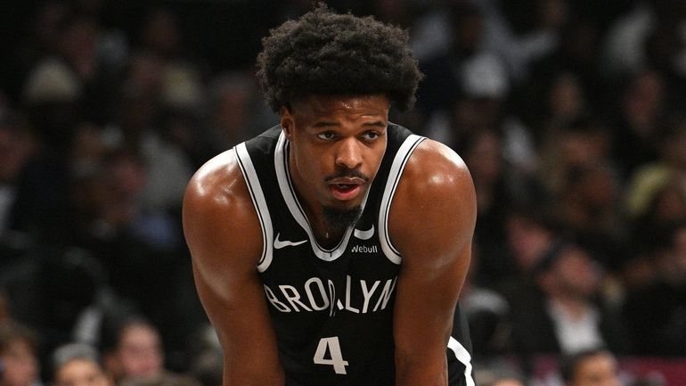 Nets guard Dennis Smith Jr. looks on against the Cavaliers...