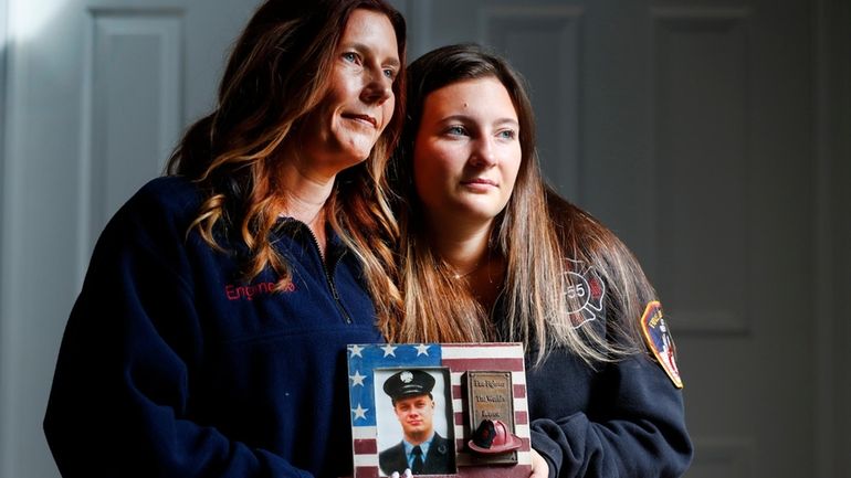 Pamela Yarosz and her daughter Capri are shown with a...