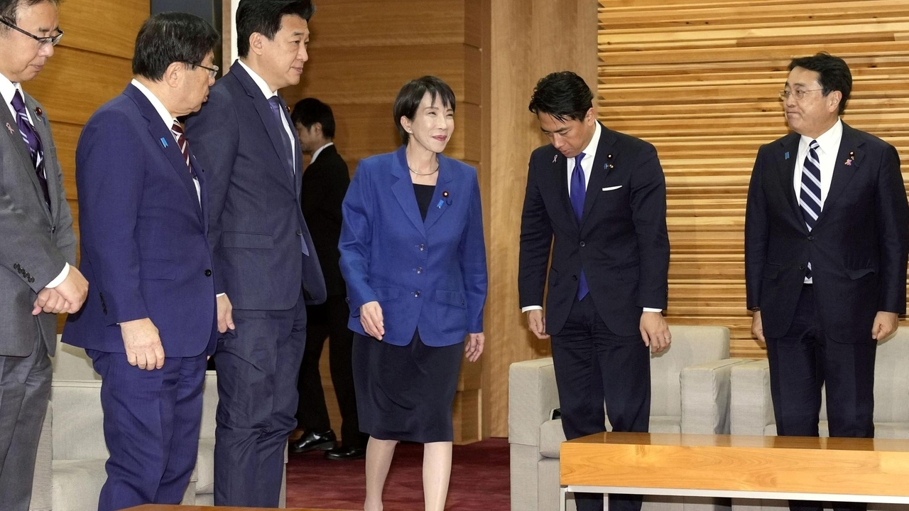 Japan OKs $135 billion stimulus package to help revive its