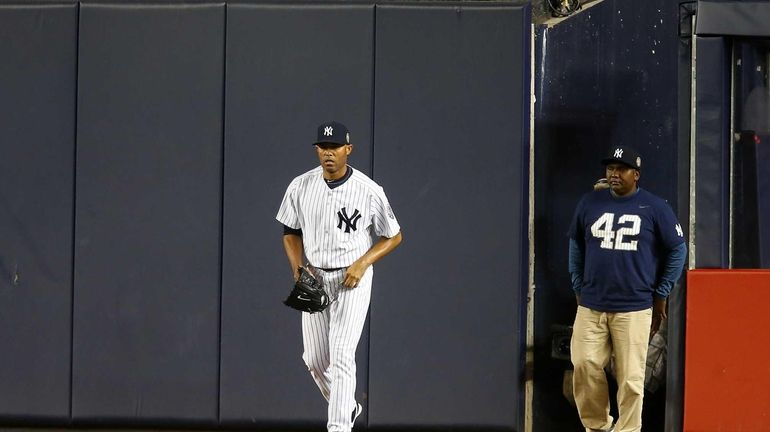 Mariano Rivera of the Yankees enters the game in the...