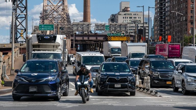 Traffic at the 59th St. Bridge in Manhattan today. August...