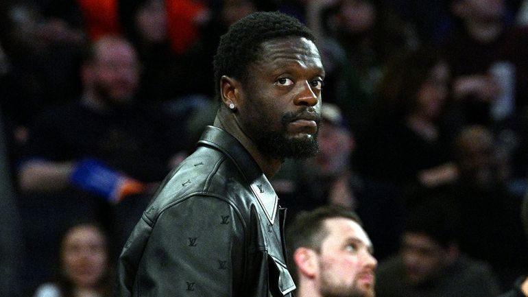 Knicks forward Julius Randle looks on during a timeout against...