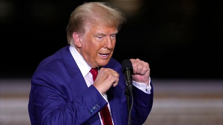 Republican presidential nominee former President Donald Trump speaks during a...