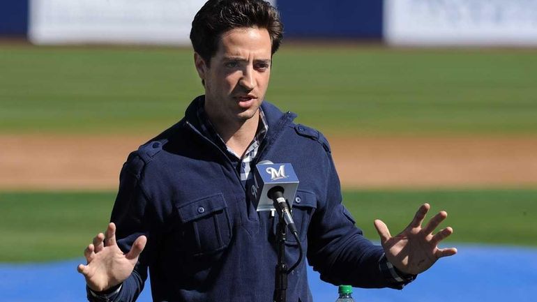 Ryan Braun of the Milwaukee Brewers talks to the media...