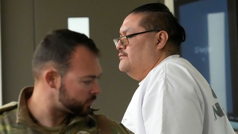 Death row inmate Taberon Honie arrives for a Utah Board...