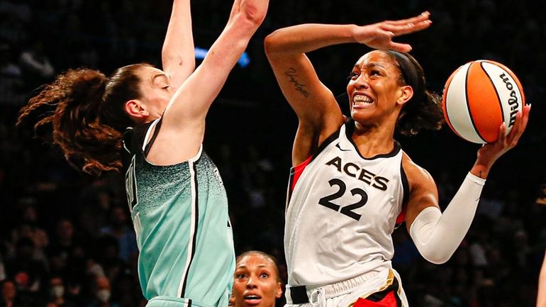 A'ja Wilson of the Las Vegas Aces attempts a dunk against...