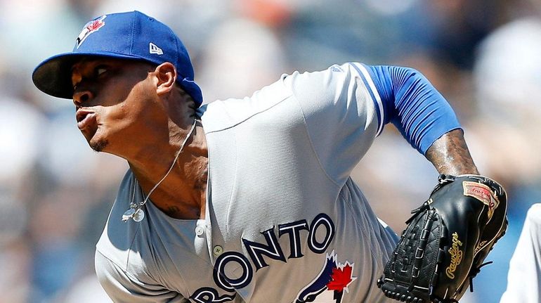 Blue Jays pitcher Marcus Stroman deliers against the Yankees at Yankee...