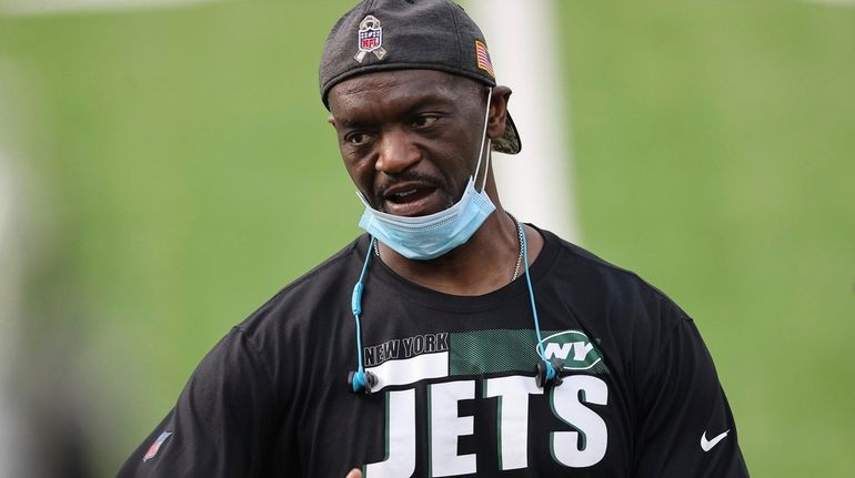 Jets coach Frank Bush talks before an NFL game against...