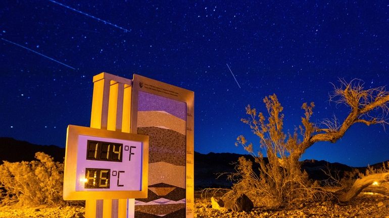 A long exposure image shows the recorded temperature on a...