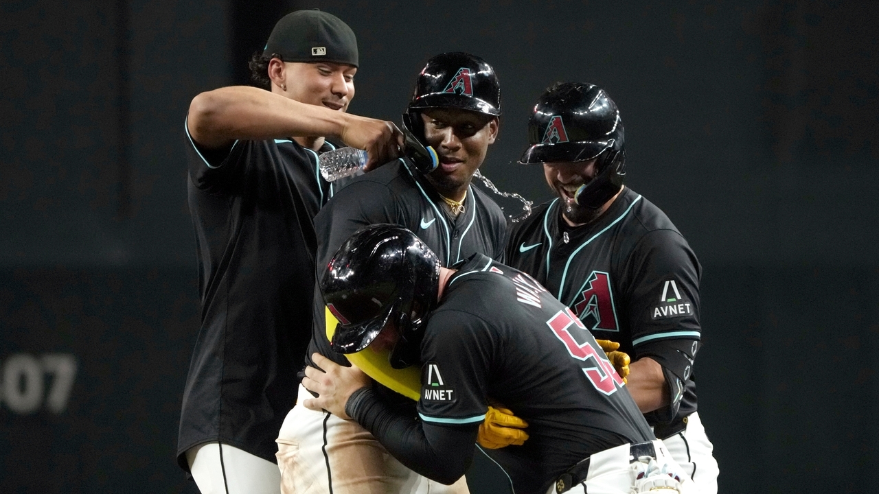 Geraldo Perdomo drives in run with sac fly in 9th to lift the ...