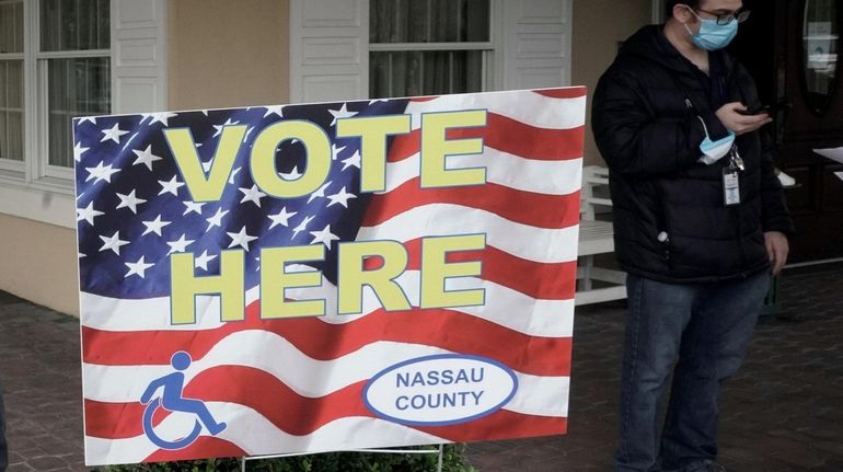 An early voting sign is displayed at the Lawrence Country...