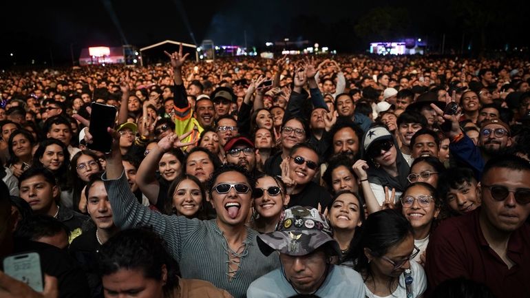 Music fans wait for Mexican singer Danna Paola's performance during...