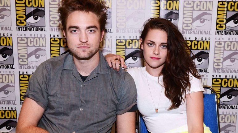 Robert Pattinson and Kristen Stewart attend "The Twilight Saga: Breaking...